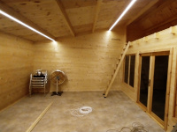 Two LED strips are lit inside the cabin